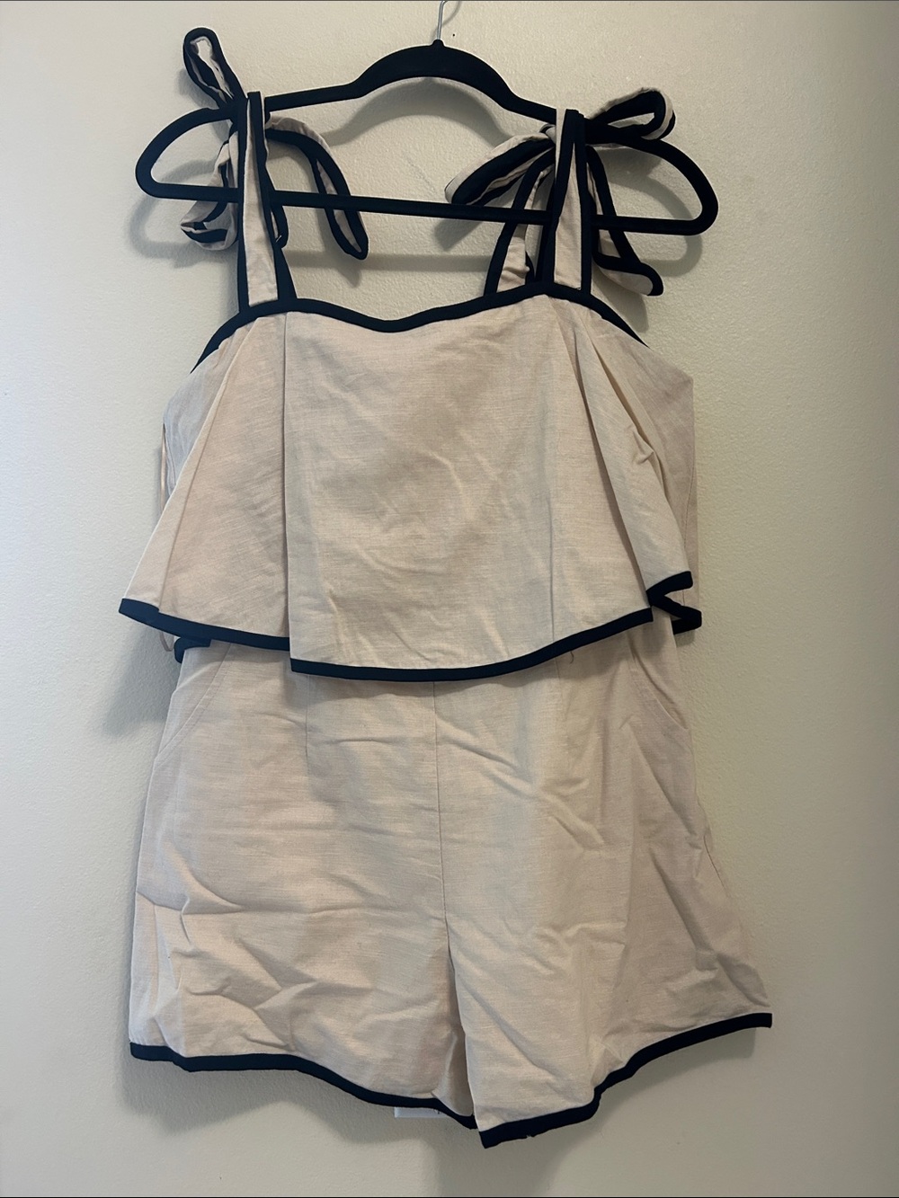 Eesome ruffle Cream Tie-Shoulder Romper with Black Trim